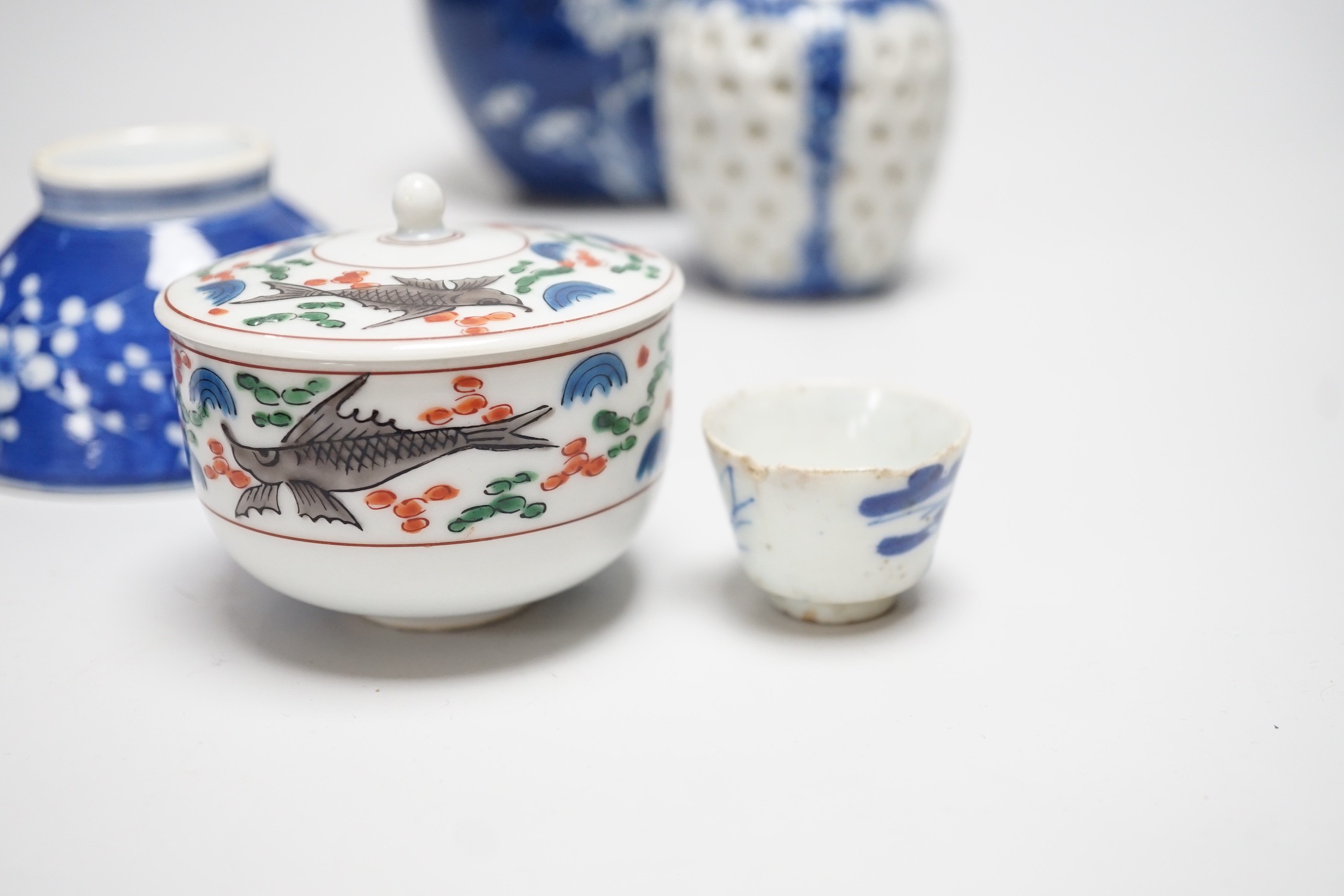 A group of mixed Chinese and Japanese porcelain vessels, tallest 11 cm